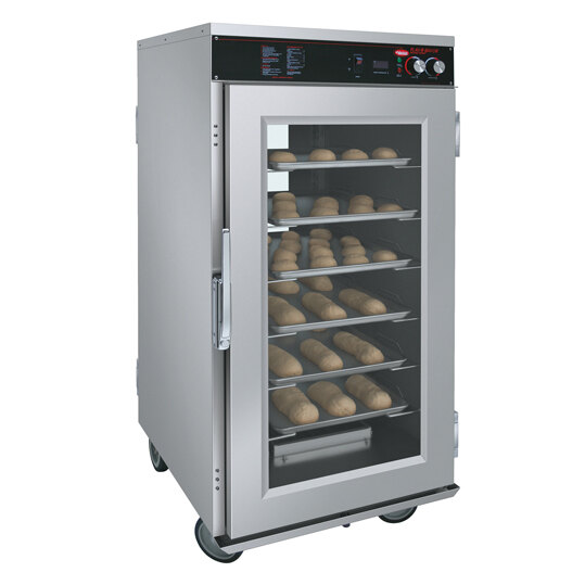 A Hatco stainless steel holding cabinet with trays of bread.