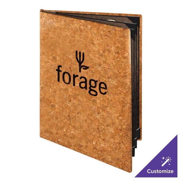 A standing booklet with a natural cork cover, featuring the word 'forage' and a small plant graphic on the front.