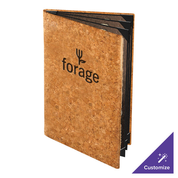 A standing booklet with a natural cork-like cover, featuring the word 'forage' and a small plant graphic on the front, with multiple black inner pages visible.