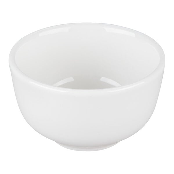 A white china sugar or bouillon cup.