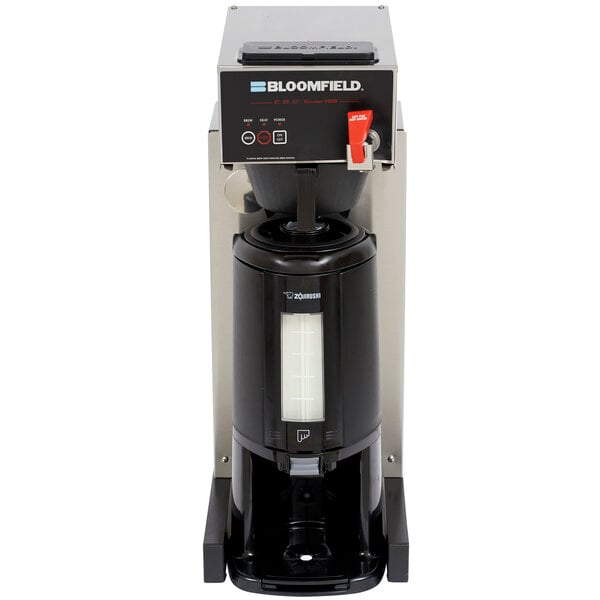A black Bloomfield automatic coffee maker with a white lid.