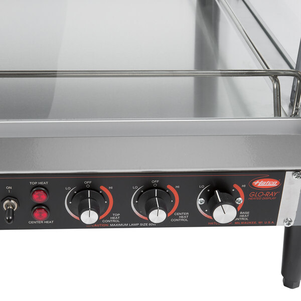 A Hatco stainless steel countertop dual shelf food warmer.