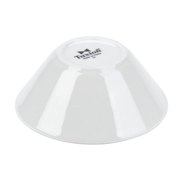 A Tuxton bright white china bowl with black text on it.