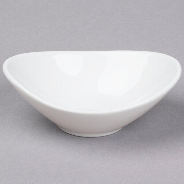 A Tuxton bright white china bowl with a small rim.