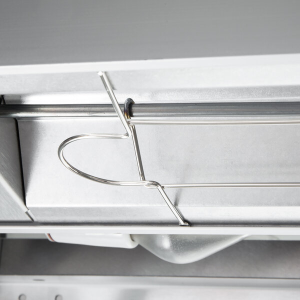 A warm red stainless steel Hatco Glo-Ray merchandiser with wire shelves.