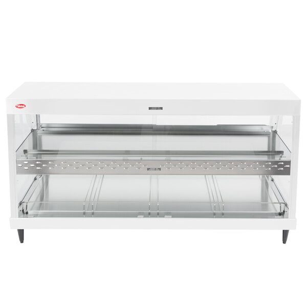 A white rectangular Hatco countertop with dual glass shelves.