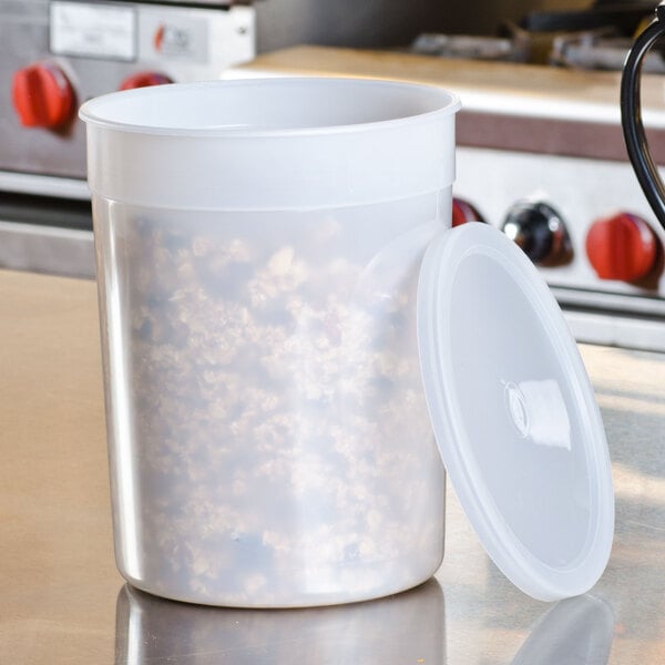 A 4 Qt. translucent plastic container with a lid containing food.