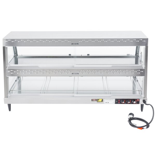 A Hatco stainless steel countertop food warmer with two glass shelves.