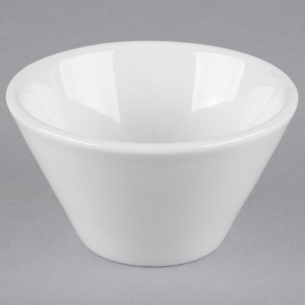 A close up of a TuxTrendz Linx bright white bouillon cup with a small rim.