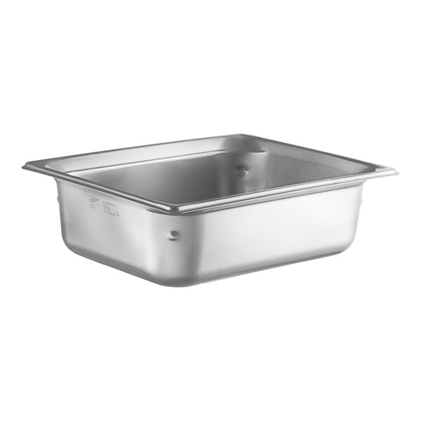 A Vollrath stainless steel hotel pan on a counter.