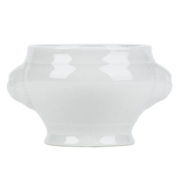 A Tuxton bright white china lion head soup tureen bowl with two handles.