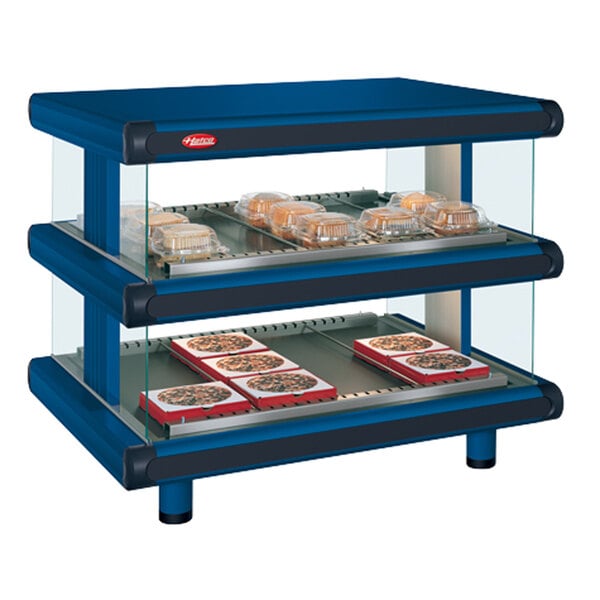 A navy blue Hatco countertop display case with food on two shelves.