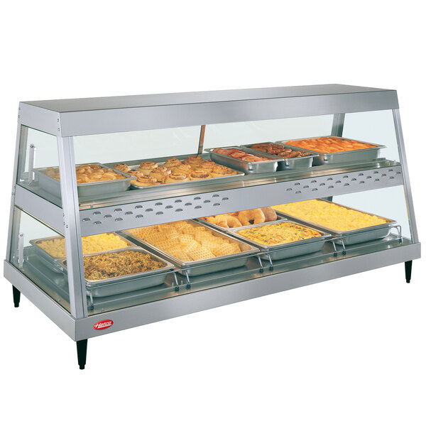 A Hatco stainless steel countertop food warmer display case with shelves and a humidity chamber.