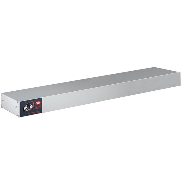 A white rectangular stainless steel Hatco strip warmer with a red light.