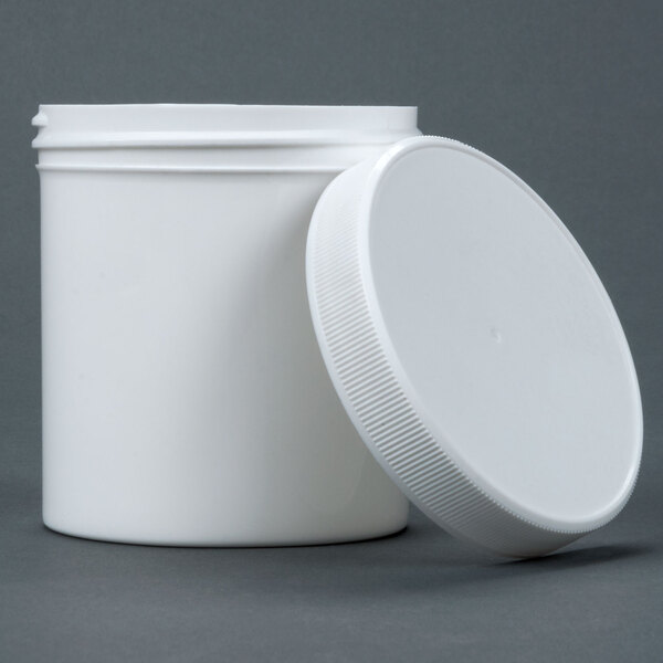 A white plastic container with a white lid.