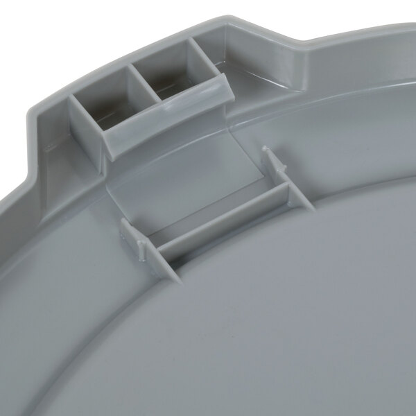 A Continental gray plastic lid with a small hole on a grey plastic container.
