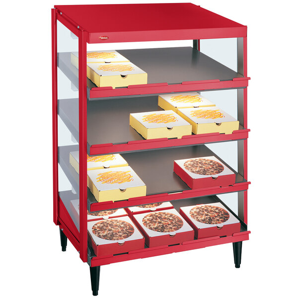 A red Hatco Glo-Ray pizza warmer display with pizza boxes on it.