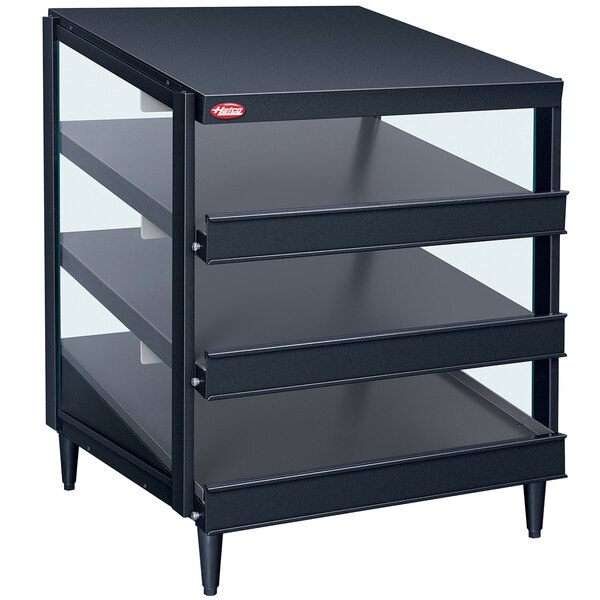 A black metal Hatco countertop pizza warmer with three shelves and glass doors.