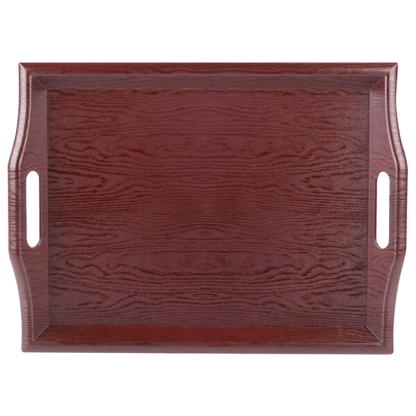 A mahogany plastic room service tray with handles.