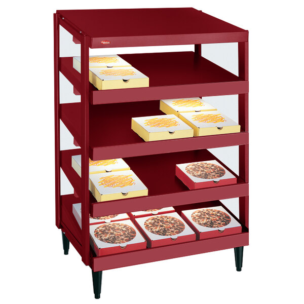A red Hatco Glo-Ray pizza warmer with pizza boxes on red shelves.