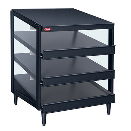 A black metal shelf with three glass shelves holding pizza.