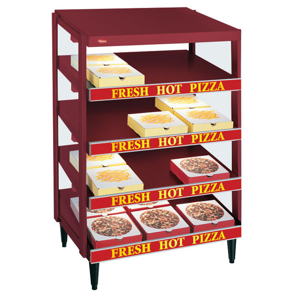 A Hatco Wine Red Glo-Ray pizza warmer with pizza boxes on a shelf.