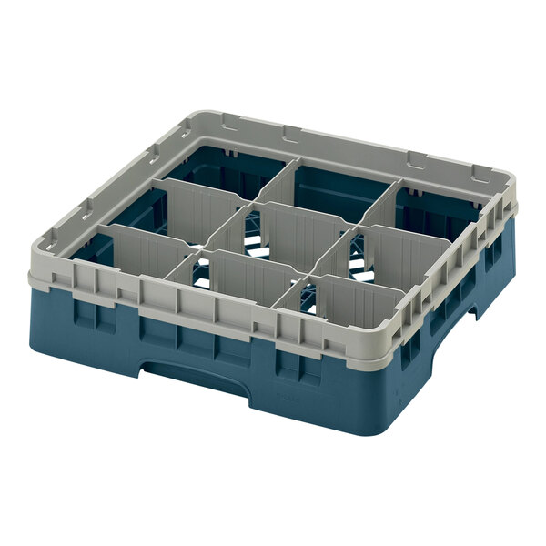 A teal plastic container with 9 compartments and holes.