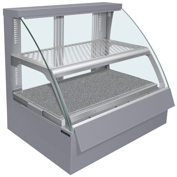 A gray metal Hatco countertop display case with a curved glass front and glass doors.