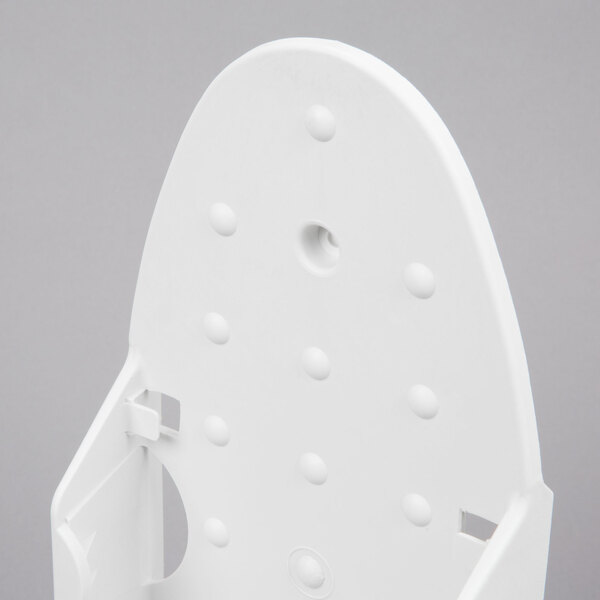 A white Rubbermaid plastic ironing board holder with holes in it.