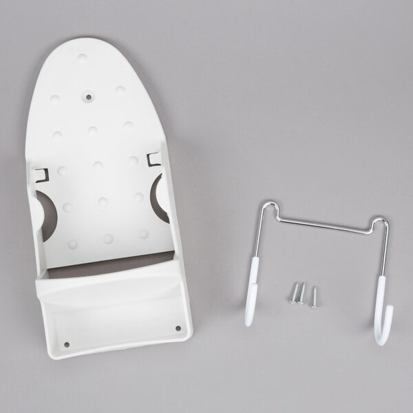 A white plastic Rubbermaid ironing board holder with a hook and screw holes.