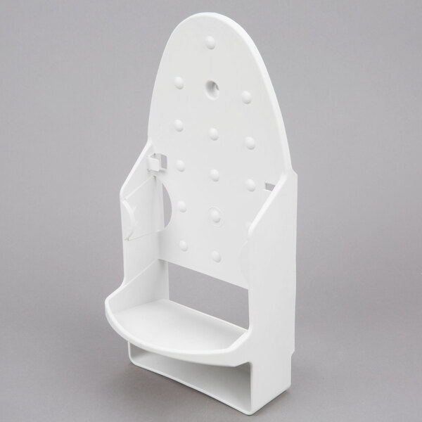 A white plastic Rubbermaid holder with holes in it.