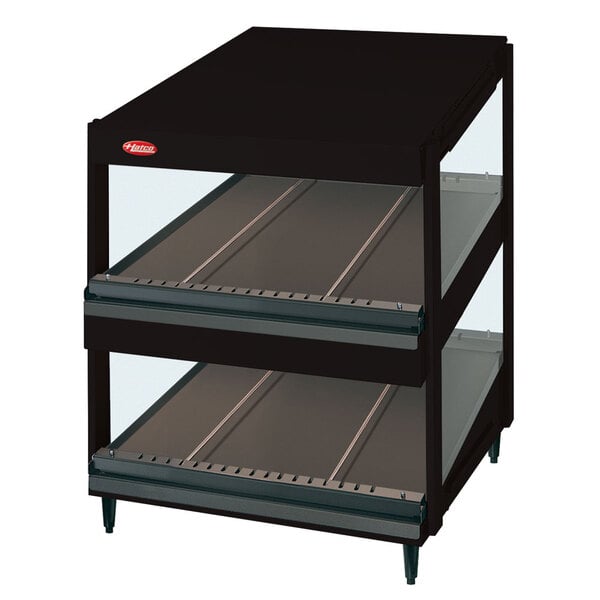 A black Hatco display case with slanted glass shelves.