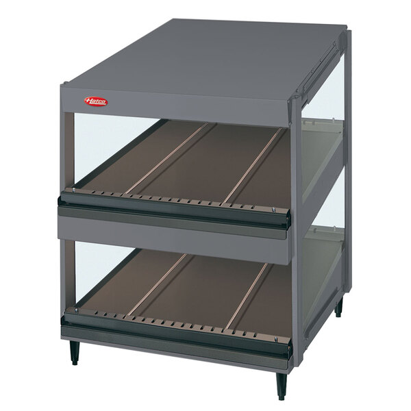 A grey metal Hatco display case with slanted shelves.