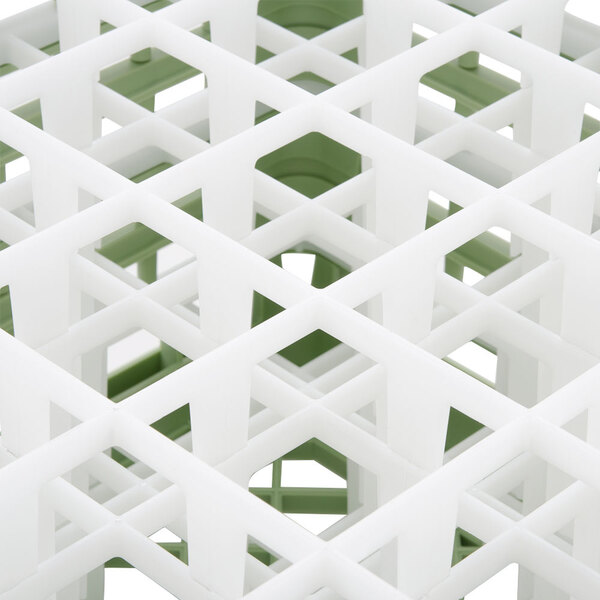 A Vollrath light green plastic glass rack with a grid pattern.