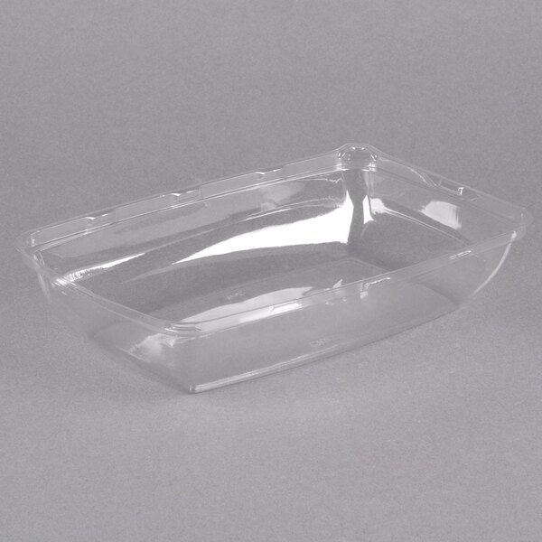 A clear plastic Sabert catering tray with a high dome lid.