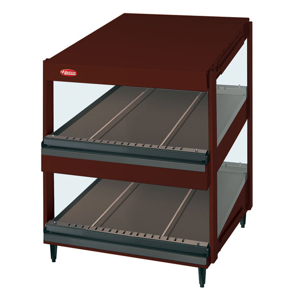 A red Hatco countertop display case with copper shelves.