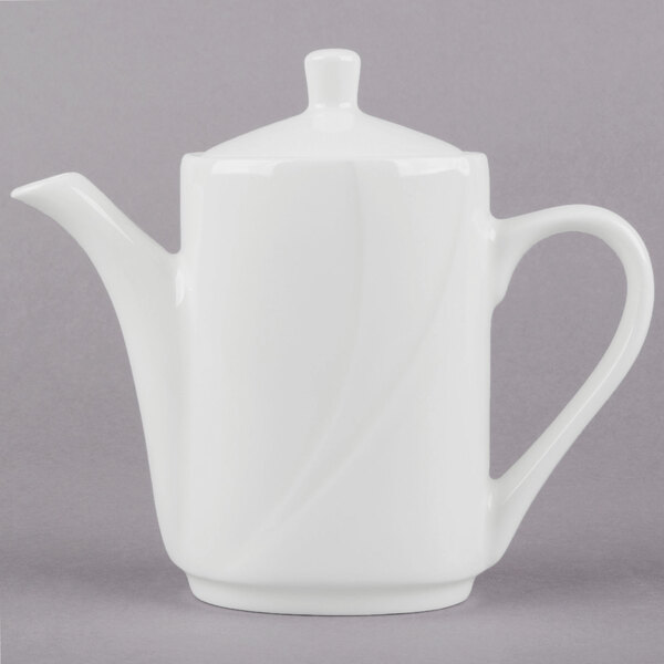 A Tuxton San Marino AlumaTux Pearl White coffee pot with a white handle and lid.