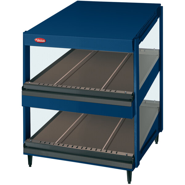 A navy blue Hatco countertop display case with two slanted shelves.