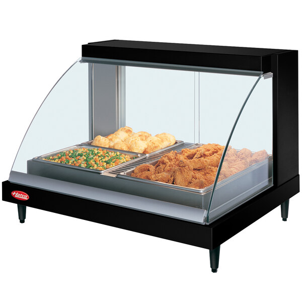 A Hatco countertop display case with food in it.