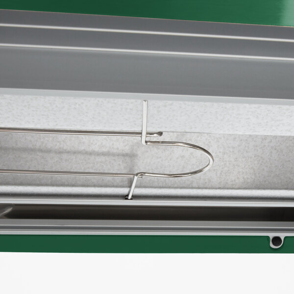 A green and silver Hatco countertop warmer with shelves.
