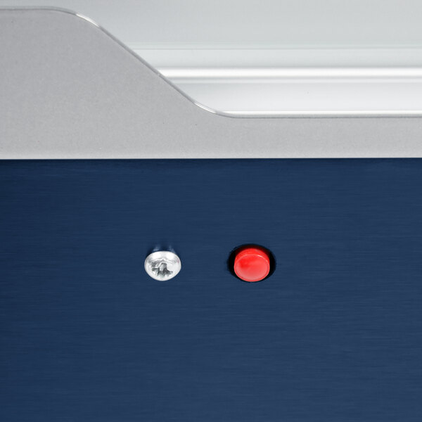 A blue and silver Hatco countertop food warmer with red and silver buttons.