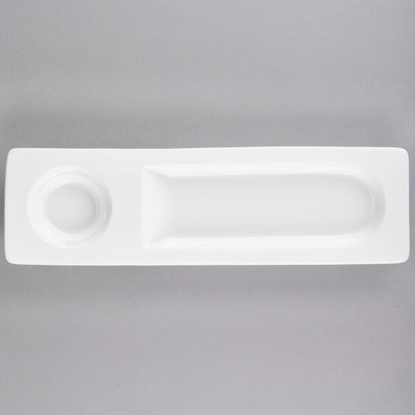 A Tuxton rectangular white china plate with 2 compartments.