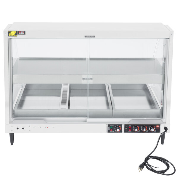 A white Hatco countertop food warmer with glass doors.