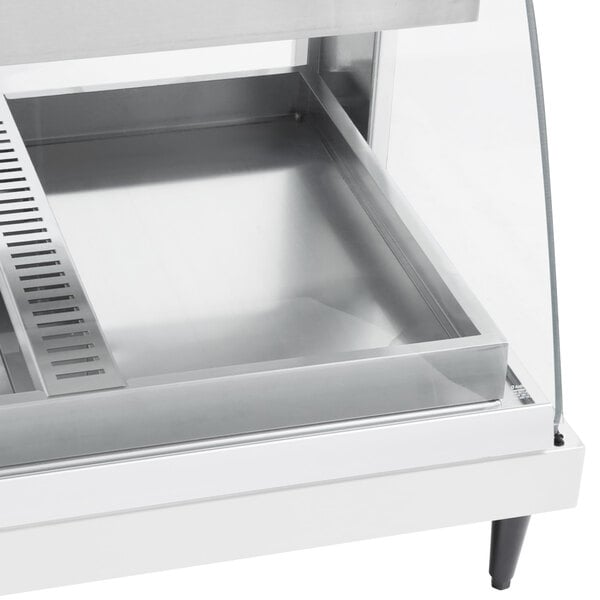 A white Hatco countertop display case with clear shelves.