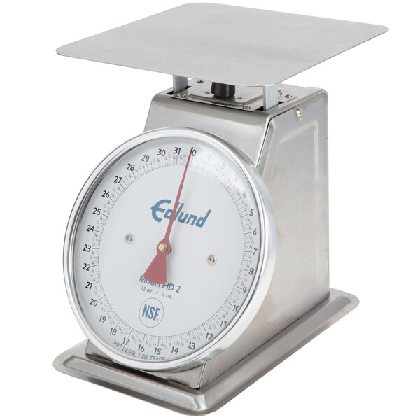 An Edlund heavy-duty portion scale with a stainless steel platform and white dial.