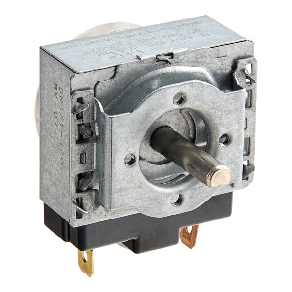 A metal device with a metal cylinder and a metal gear on top.