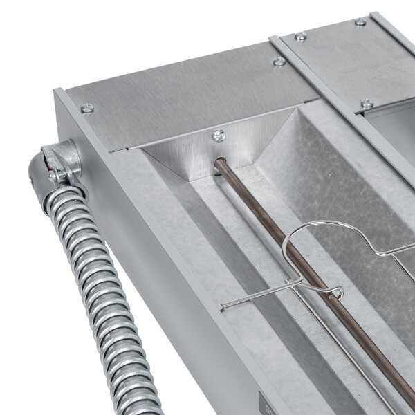 A stainless steel Hatco Glo-Ray food warmer with toggle controls on a metal rack.