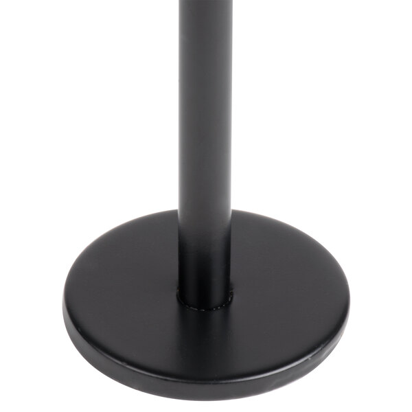 A black metal Tablecraft menu / card holder with a round base.