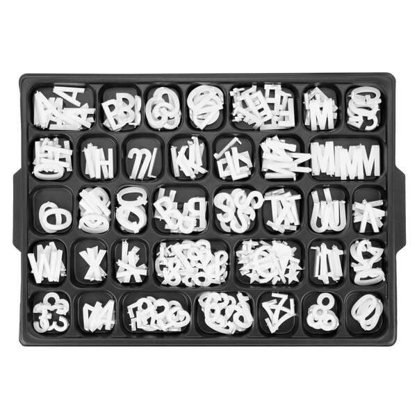 A tray of white Aarco Helvetica letters and numbers.