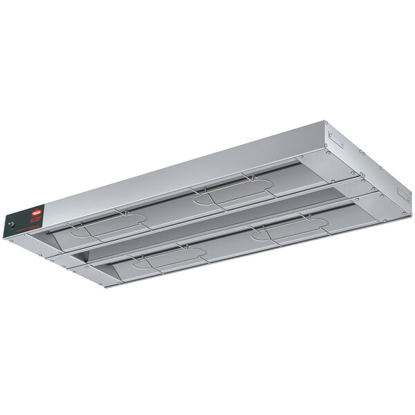 A rectangular aluminum Hatco dual infrared warmer with a label on it.